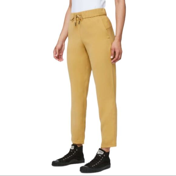 Lululemon On the Fly 7/8 Pant *Woven In Vintage Gold Style W5BPMS Women’s Size 6 - Picture 2 of 10